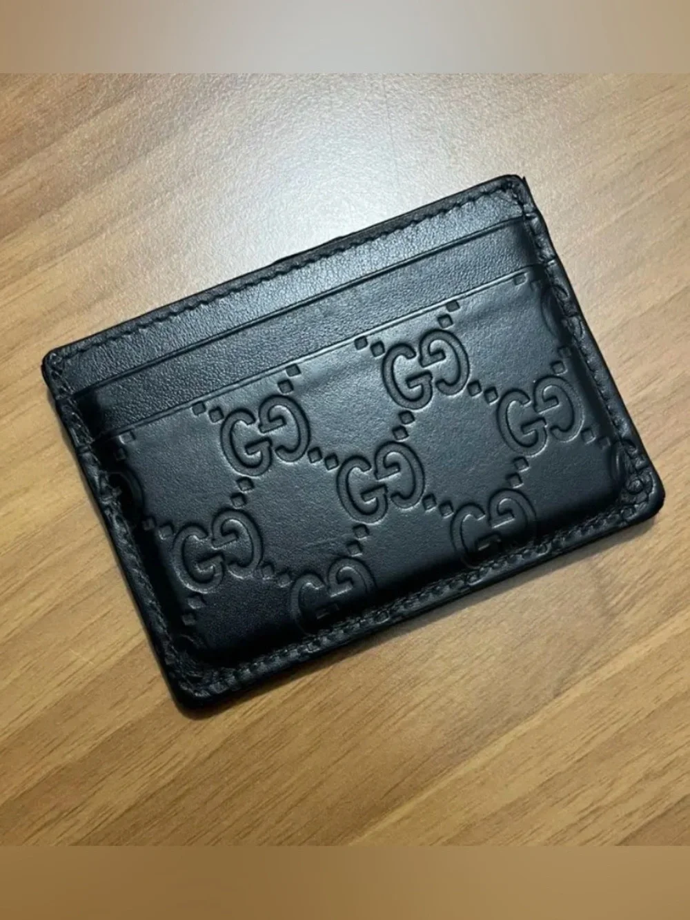 Gucci Black GG Embossed Leather Slim Card Case